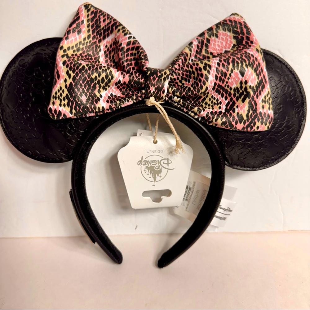 NWT. Disney Loungefly Minnie Ear Headband - Animal Print ears.  Loungefly ears